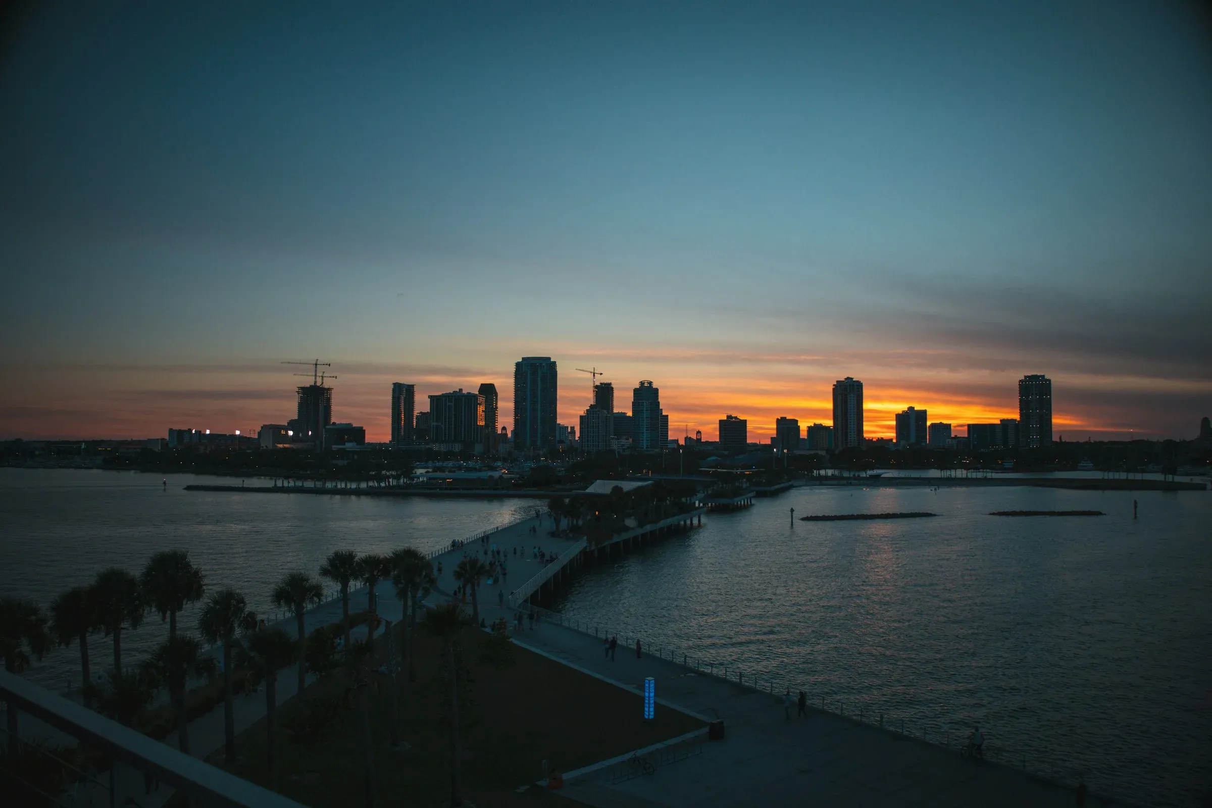 St. Petersburg skyline and St. Pete Pier at sunset on Tampa Bay